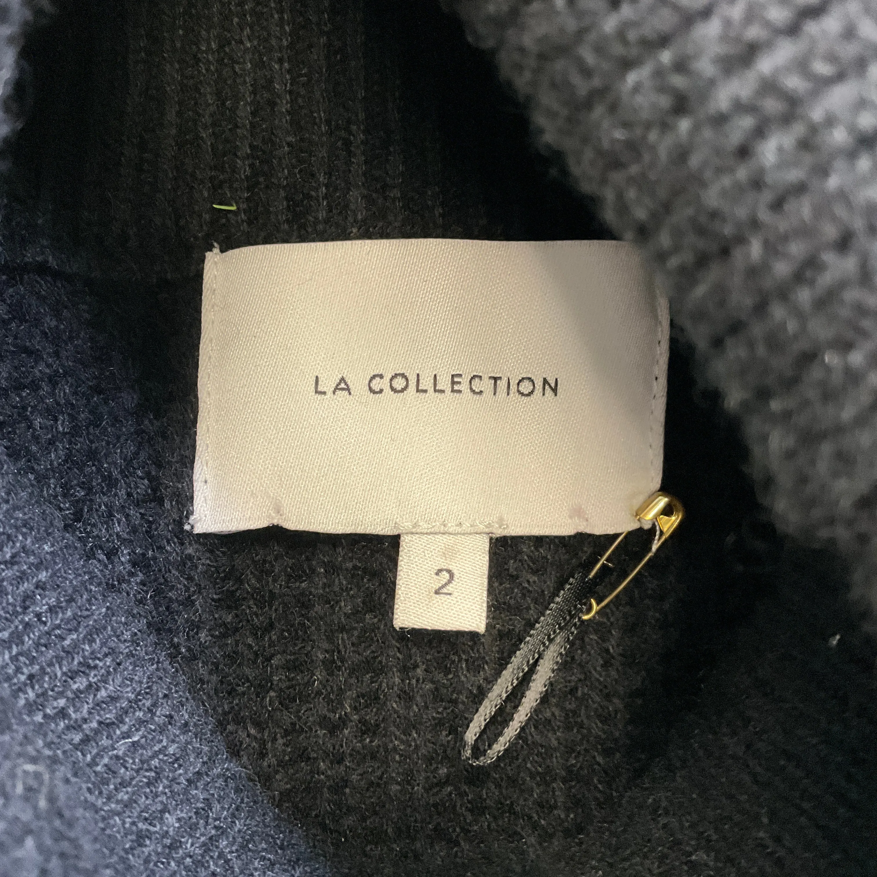 La Collection Black Sleeveless Cashmere Knit Turtleneck Sweater