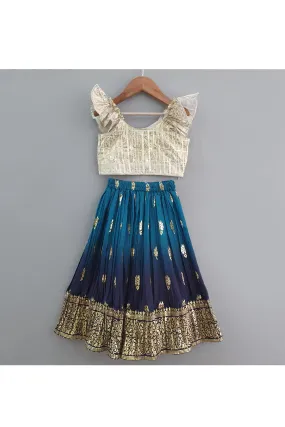 Off White Ruffle Sleeves Top With Blue Printed Lehenga