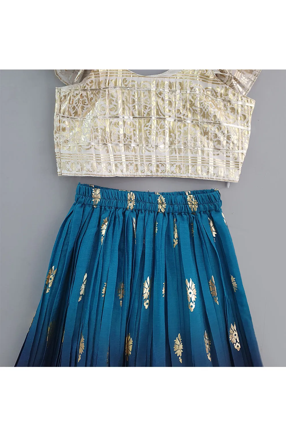 Off White Ruffle Sleeves Top With Blue Printed Lehenga