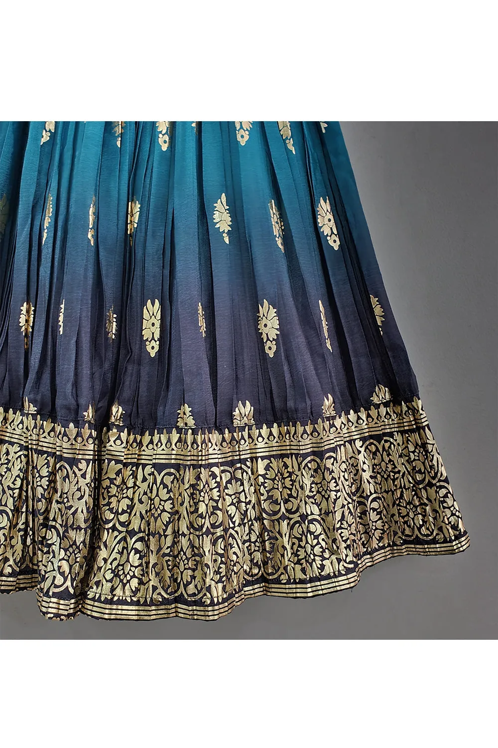 Off White Ruffle Sleeves Top With Blue Printed Lehenga