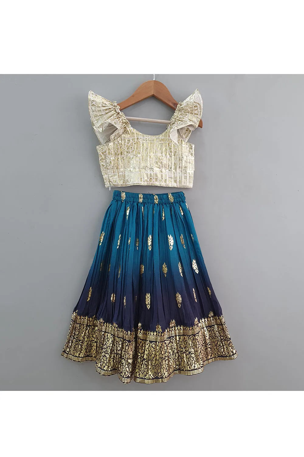 Off White Ruffle Sleeves Top With Blue Printed Lehenga