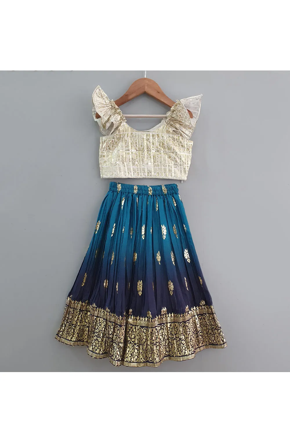 Off White Ruffle Sleeves Top With Blue Printed Lehenga