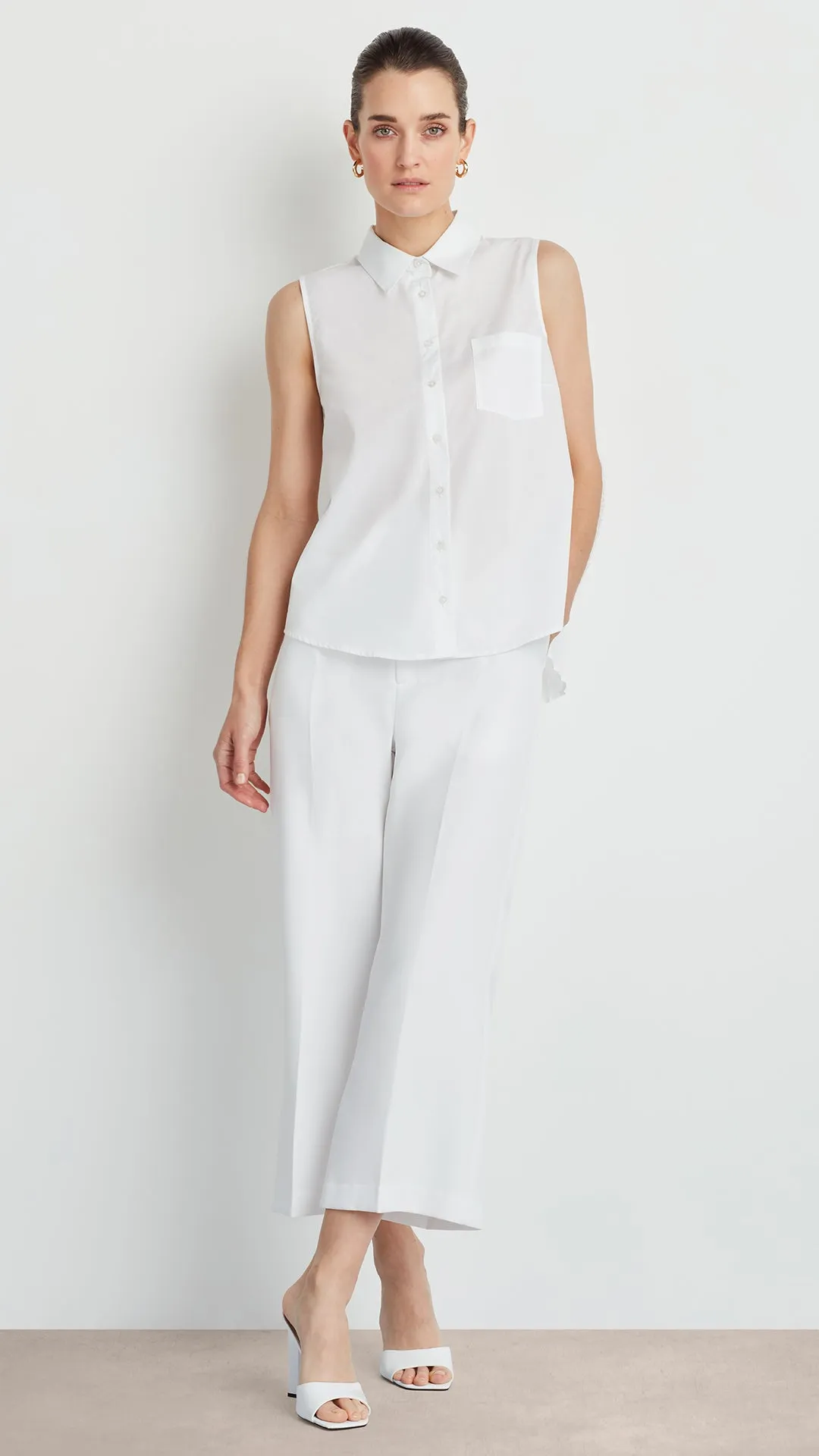 SLEEVELESS PLEATED POPLIN SHIRT