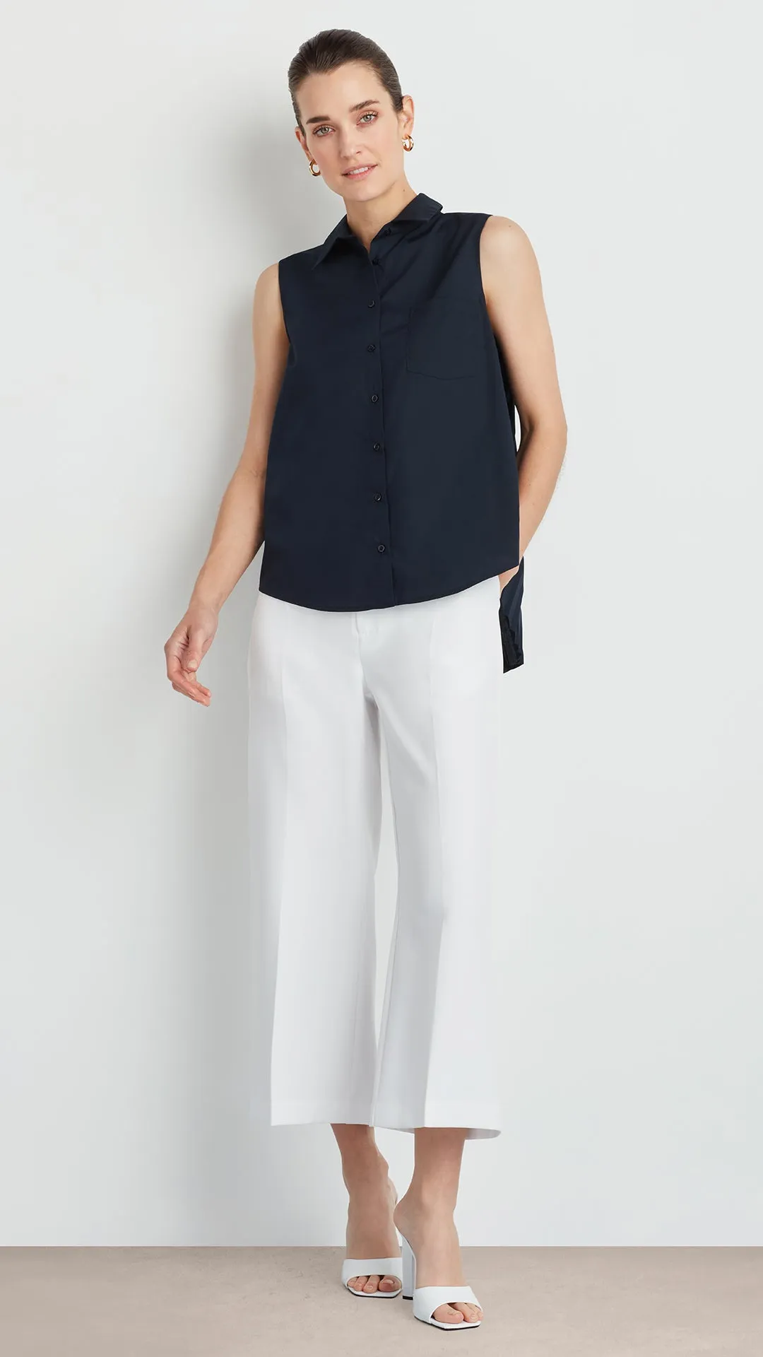 SLEEVELESS PLEATED POPLIN SHIRT